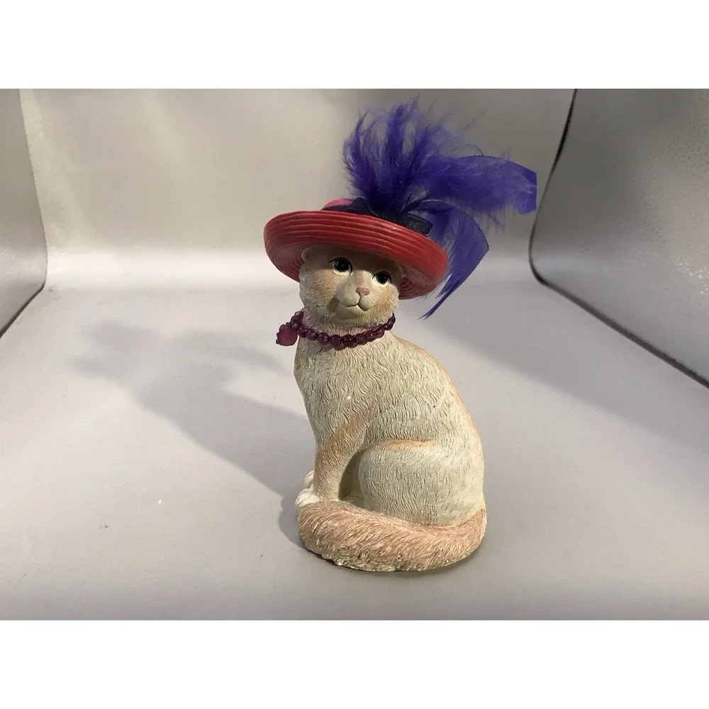 Pretty White Resin Kitty With A Red Hat With Purple Feather